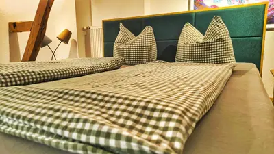 Ein Bett oder Betten in einem Zimmer der Unterkunft bei GRETA Wohnung 77