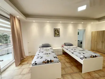 Ein Bett oder Betten in einem Zimmer der Unterkunft Monteurwohnung mit Balkon in Duisburg