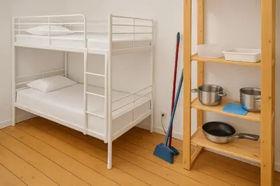 Ein Bett oder Betten in einem Zimmer der Unterkunft Bett im Durchgangszimmer