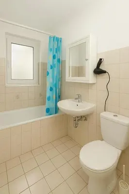 Ein Badezimmer in der Unterkunft Bett im Durchgangszimmer