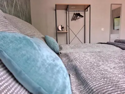 Ein Bett oder Betten in einem Zimmer der Unterkunft PK Apartment 2 in Seenähe & mit Garten