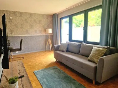 Ein Sitzbereich in der Unterkunft PK Apartment 2 in Seenähe & mit Garten