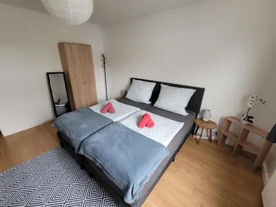 Ein Bett oder Betten in einem Zimmer der Unterkunft Nähe Dortmund, geräumige Unterkunft in Castrop-Rauxel mit top Verkehrsanbindung