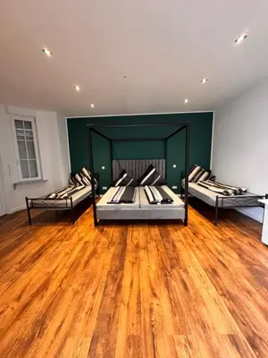 Ein Bett oder Betten in einem Zimmer der Unterkunft Rheinberg Whg 2