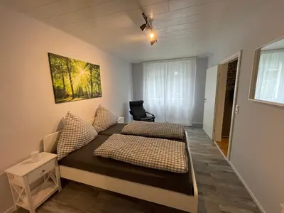 Ein Bett oder Betten in einem Zimmer der Unterkunft Ferienwohnung Nelly
