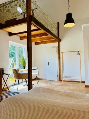 Ein Bett oder Betten in einem Zimmer der Unterkunft b e d & a g e d e s i g n -large- wunderschönes Zimmer mit Bad - Rechnungserstellung für Geschäftsreisende & Firmen