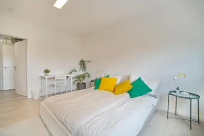 Ein Bett oder Betten in einem Zimmer der Unterkunft Casa Dortmund