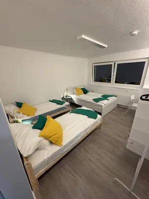 Ein Bett oder Betten in einem Zimmer der Unterkunft Casa Dortmund