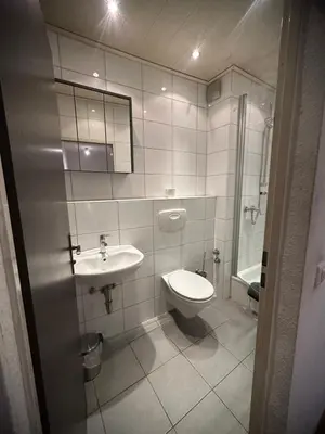 Ein Badezimmer in der Unterkunft Helle Wohnung für 8 Personen mit 4 Schlafzimmern