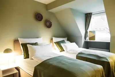 Ein Bett oder Betten in einem Zimmer der Unterkunft Deluxe! 15min Messe & Uniklinik, Arbeitsplatz, Boxspring