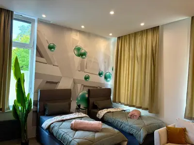 Ein Bett oder Betten in einem Zimmer der Unterkunft Aura Apartment Herne