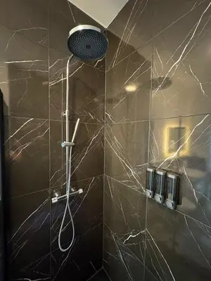 Ein Badezimmer in der Unterkunft Aura Apartment Herne