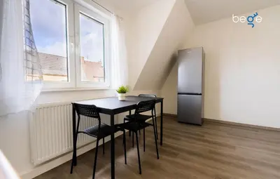 Ein Sitzbereich in der Unterkunft BEGE APARTMENTS CrewLodge