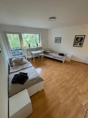 Ein Sitzbereich in der Unterkunft Sonniges CityNest Apartment mit Balkon und bester Verkehrsanbindung Komplette Unterkunft