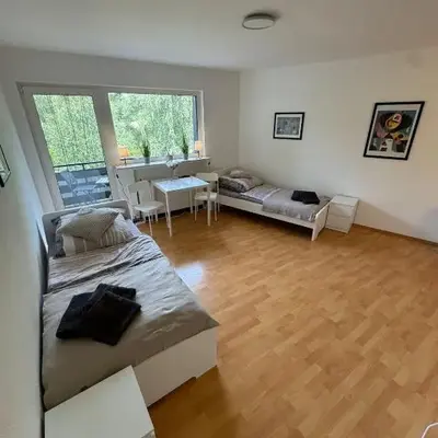 Sonniges CityNest Apartment mit Balkon und bester Verkehrsanbindung Komplette Unterkunft