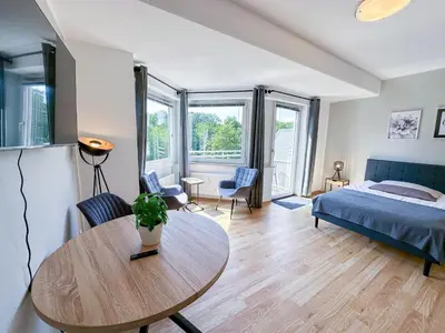 Ein Bett oder Betten in einem Zimmer der Unterkunft Stadtwald Langzeit-Apartment - Küche - Waschmaschine - S-Bahn direkt