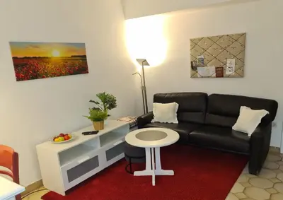 Ein Sitzbereich in der Unterkunft Cozy basement apartment in Mettmann