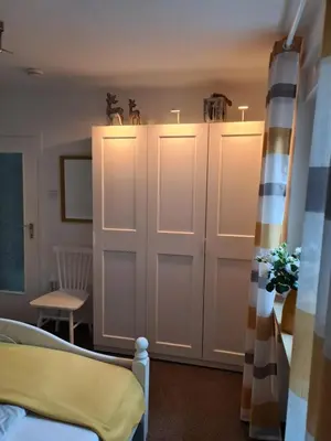Ein Bett oder Betten in einem Zimmer der Unterkunft Cozy basement apartment in Mettmann