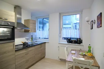 Küche/Küchenzeile in der Unterkunft apartmondo Apartmentwohnungen Remscheid