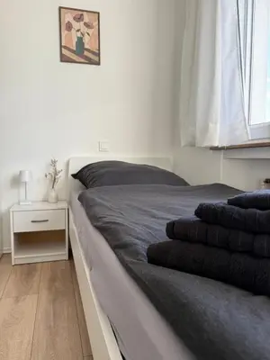 Ein Bett oder Betten in einem Zimmer der Unterkunft Monteurwohnung mit Balkon und Parkplatz