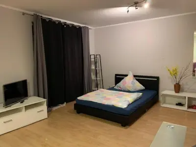Ein Bett oder Betten in einem Zimmer der Unterkunft Düssel-Oase