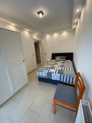 Ein Bett oder Betten in einem Zimmer der Unterkunft MarlAlvi