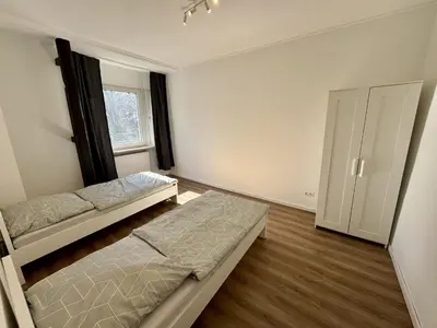 Ein Bett oder Betten in einem Zimmer der Unterkunft Spacious apartment in Solingen with Perfect connection