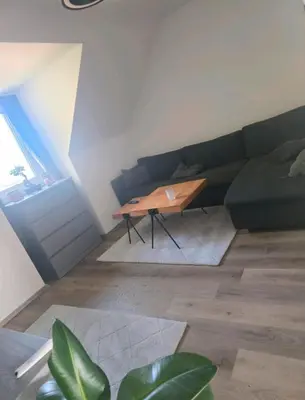 Ein Sitzbereich in der Unterkunft Eine saubere und schöne Wohnung für paar oder Familie oder Einzelpersonen