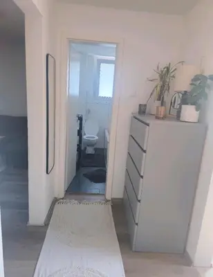 Ein Bett oder Betten in einem Zimmer der Unterkunft Eine saubere und schöne Wohnung für paar oder Familie oder Einzelpersonen