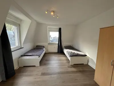 Ein Bett oder Betten in einem Zimmer der Unterkunft Cheap apartment in Solingen near Wuppertal