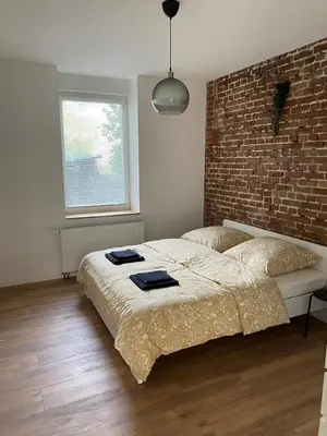 Ein Bett oder Betten in einem Zimmer der Unterkunft Heart of Essen