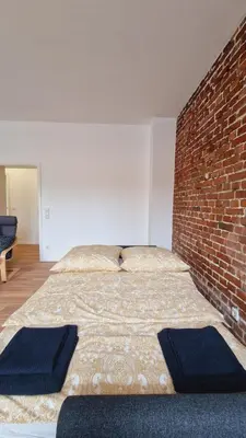 Ein Bett oder Betten in einem Zimmer der Unterkunft Heart of Essen