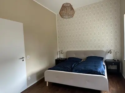 Ein Bett oder Betten in einem Zimmer der Unterkunft Neubau FeWo in Haltern am See