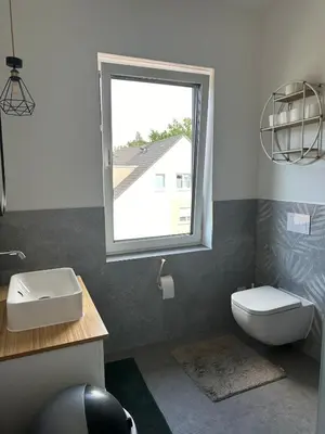 Ein Badezimmer in der Unterkunft Neubau FeWo in Haltern am See