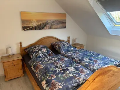 Ein Bett oder Betten in einem Zimmer der Unterkunft Schöne Maisonette-Wohnung in ruhiger Lage