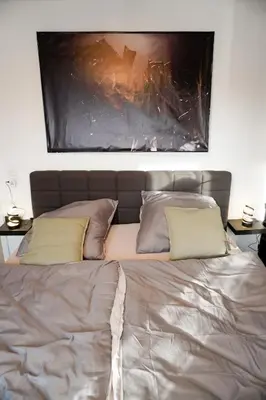 Ein Bett oder Betten in einem Zimmer der Unterkunft M House Do City Privatzimmer mit Balkon & Self Check-in