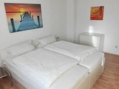 Ein Bett oder Betten in einem Zimmer der Unterkunft Apartment Ruhr-Valley West, excellent place