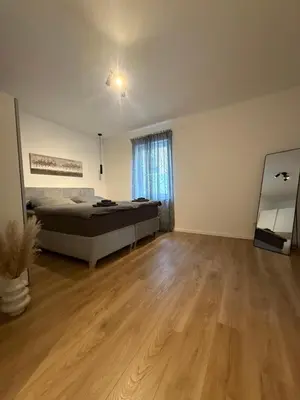 Ein Bett oder Betten in einem Zimmer der Unterkunft Wohnung Schwerte