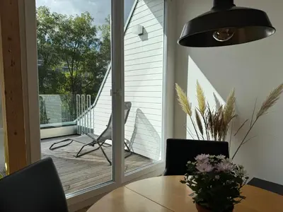 Ein Sitzbereich in der Unterkunft NOOQA Duisburg - Living Collection - Parkplatz, Smart TV, Küche, voll ausgestattet