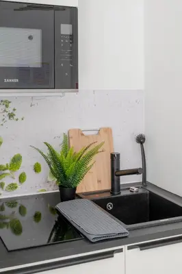 Küche/Küchenzeile in der Unterkunft SpaceStays Bunker Sweet Messe WI-FI TV