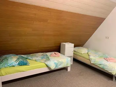 Ein Bett oder Betten in einem Zimmer der Unterkunft Fair House Near Düsseldorf- 5 Bedrooms, Garden, Terrace Parking