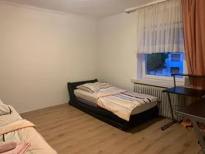Ein Bett oder Betten in einem Zimmer der Unterkunft Fair House Near Düsseldorf- 5 Bedrooms, Garden, Terrace Parking