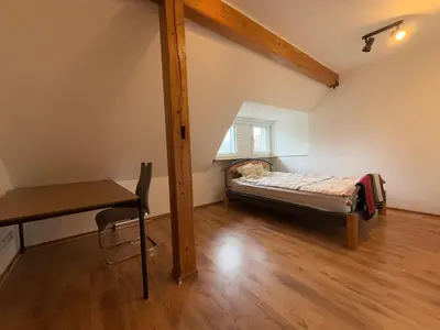 Ein Bett oder Betten in einem Zimmer der Unterkunft Schalker 3