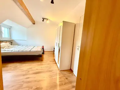 Ein Bett oder Betten in einem Zimmer der Unterkunft Schalker 3