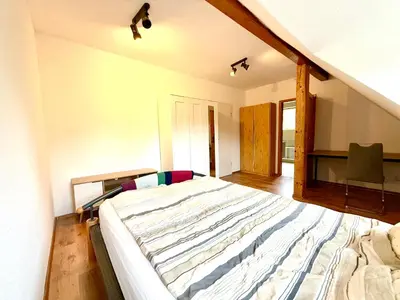 Ein Bett oder Betten in einem Zimmer der Unterkunft Schalker 3