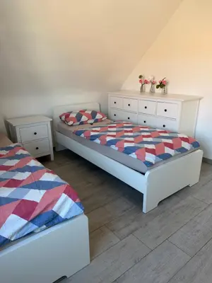Ein Bett oder Betten in einem Zimmer der Unterkunft Sweet Home Appartements 2