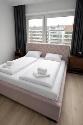 Ein Bett oder Betten in einem Zimmer der Unterkunft 3 BR City Apartment near Messe Düsseldorf