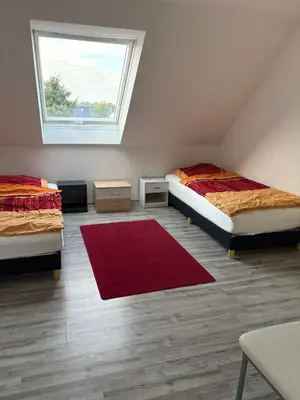 Ein Bett oder Betten in einem Zimmer der Unterkunft Ferienwohnung Werne