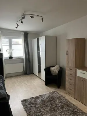 Ein Sitzbereich in der Unterkunft Gemütliches, barrierefreies Apartment in Dortmund-Brackel, Ruhige Lage, nur 5 Minuten zum Flughafen Dortmund