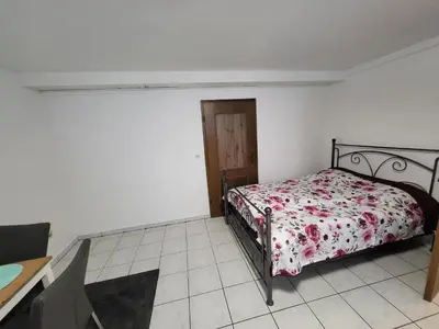 Ein Bett oder Betten in einem Zimmer der Unterkunft Light & Loft Apartment